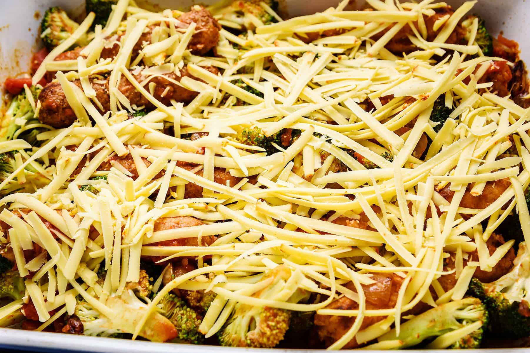 Adding grated cheese