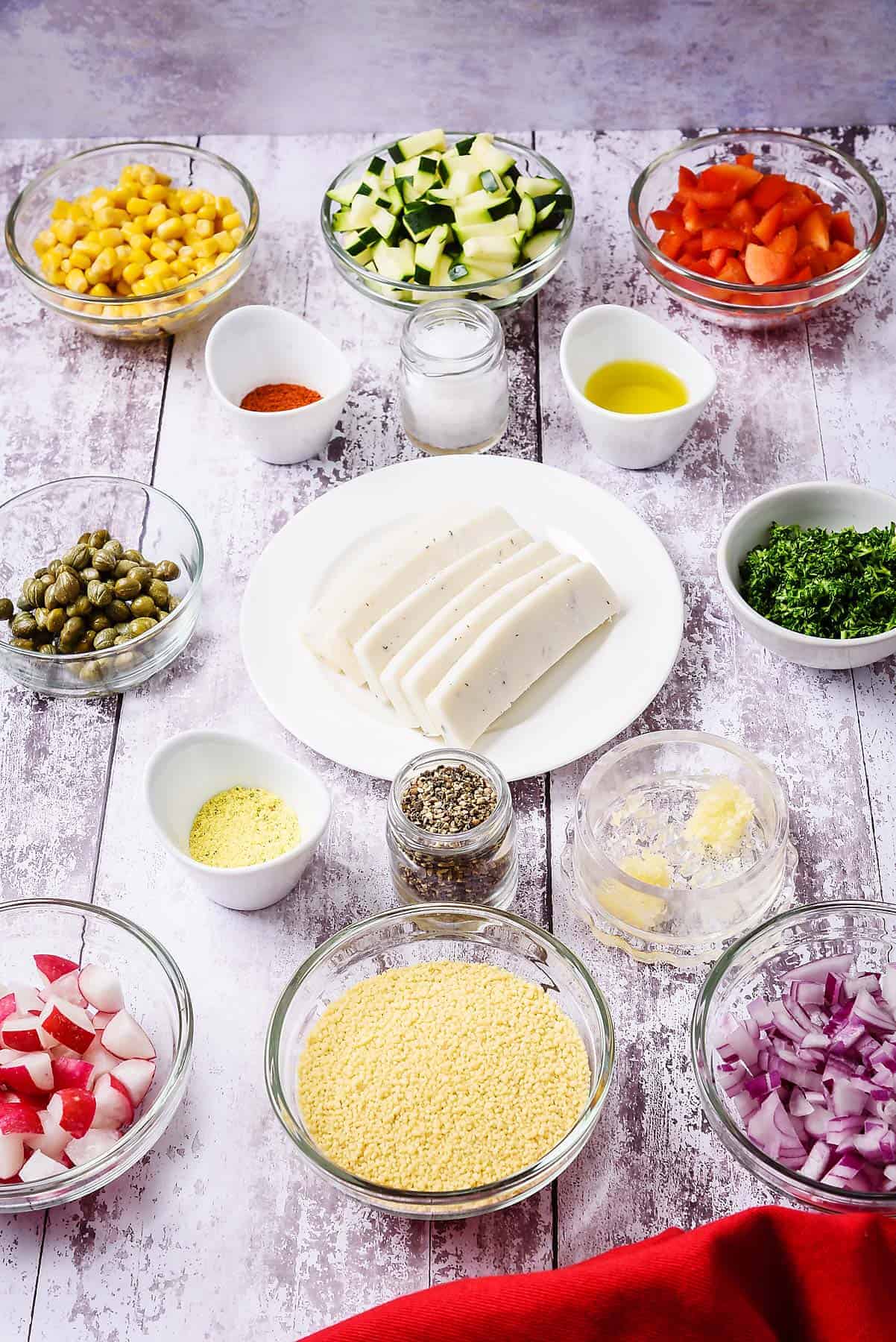 Close up of ingredients for couscous & halloumi salad