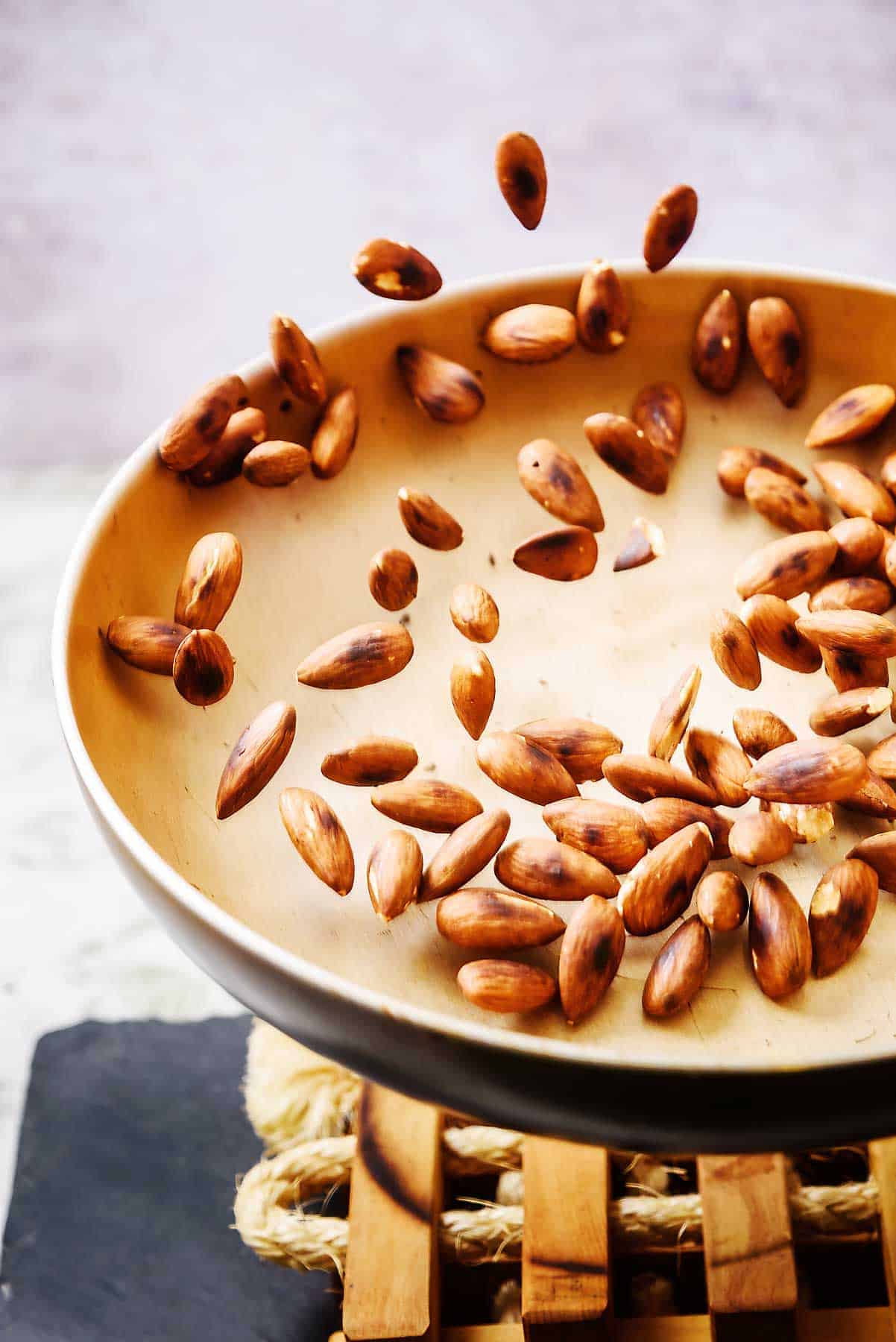 Tossing the almonds in a pan