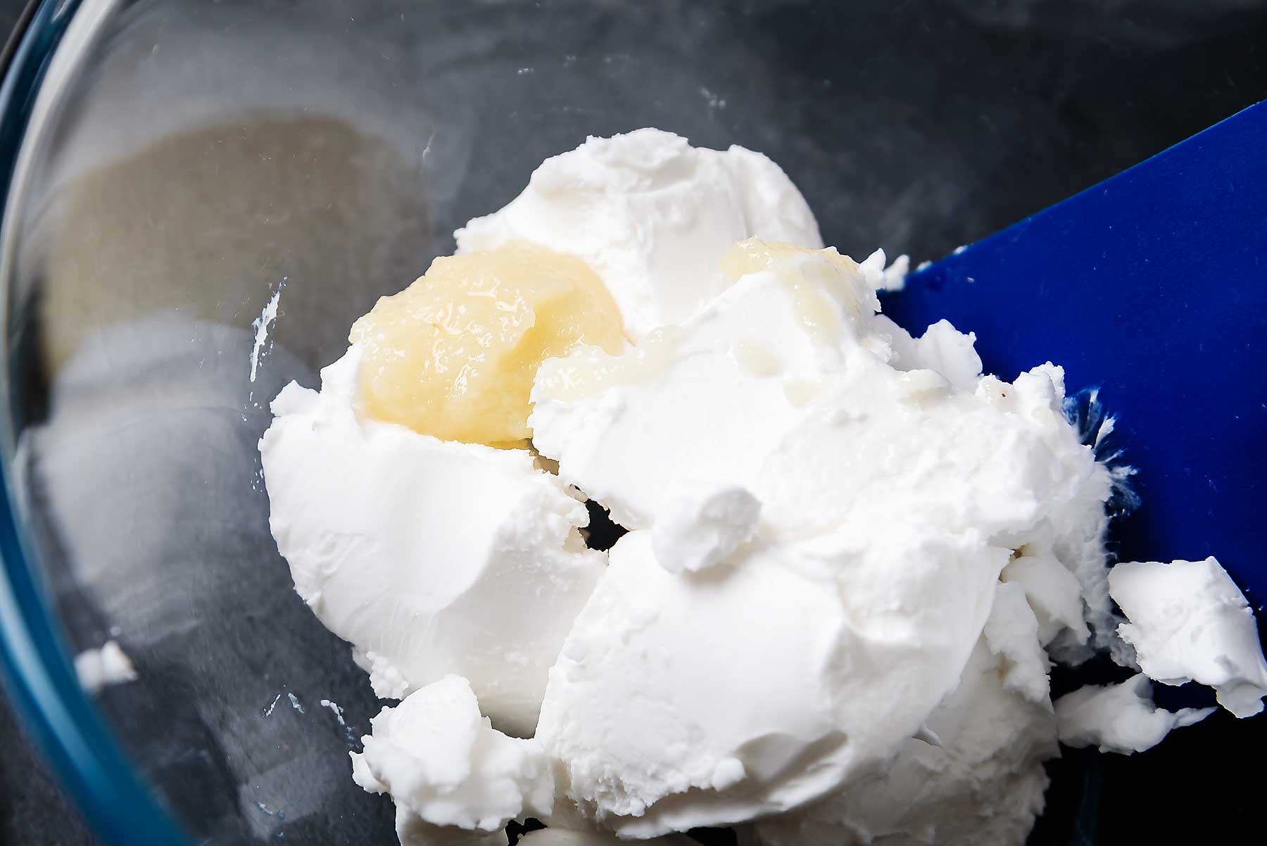 Soft cheese and garlic in a bowl