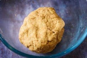 Bowl with vegan cumin cobbler dough in it