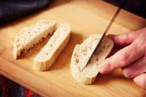 Cutting sliced bread lengthways