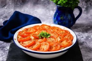 Vegan Cauliflower & Walnut Cheese topped with sliced tomatoes