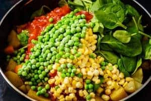 Adding the remaining vegetables to the pan