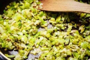Chopped leeks cooking in a pan