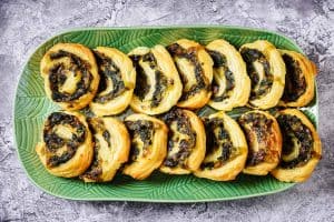 Plate full of Cheesy Spinach & Leek Swirls