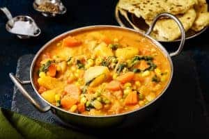 Vegan Potato & Vegetable Curry in a serving bowl