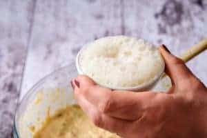 Adding the vinegar and bi carb mixture