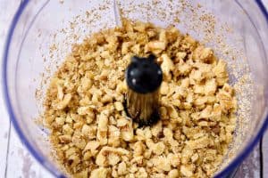 Chopped walnuts in a processor