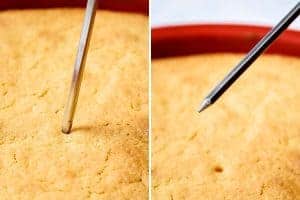 Testing the cooked cake with a skewer