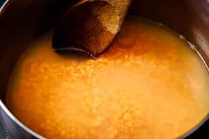 Lentils in a pan with stock