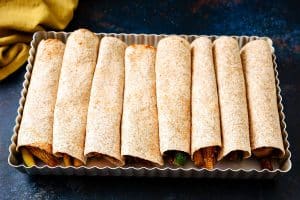 Oven dish with 8 rolled mini tortillas