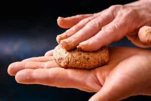 Shaping a pattie in the palm of a hand