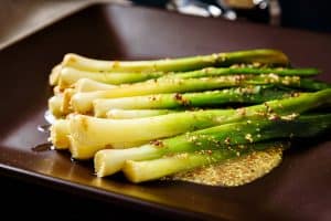 Baby Leeks with Wholegrain Mustard on a serving plate